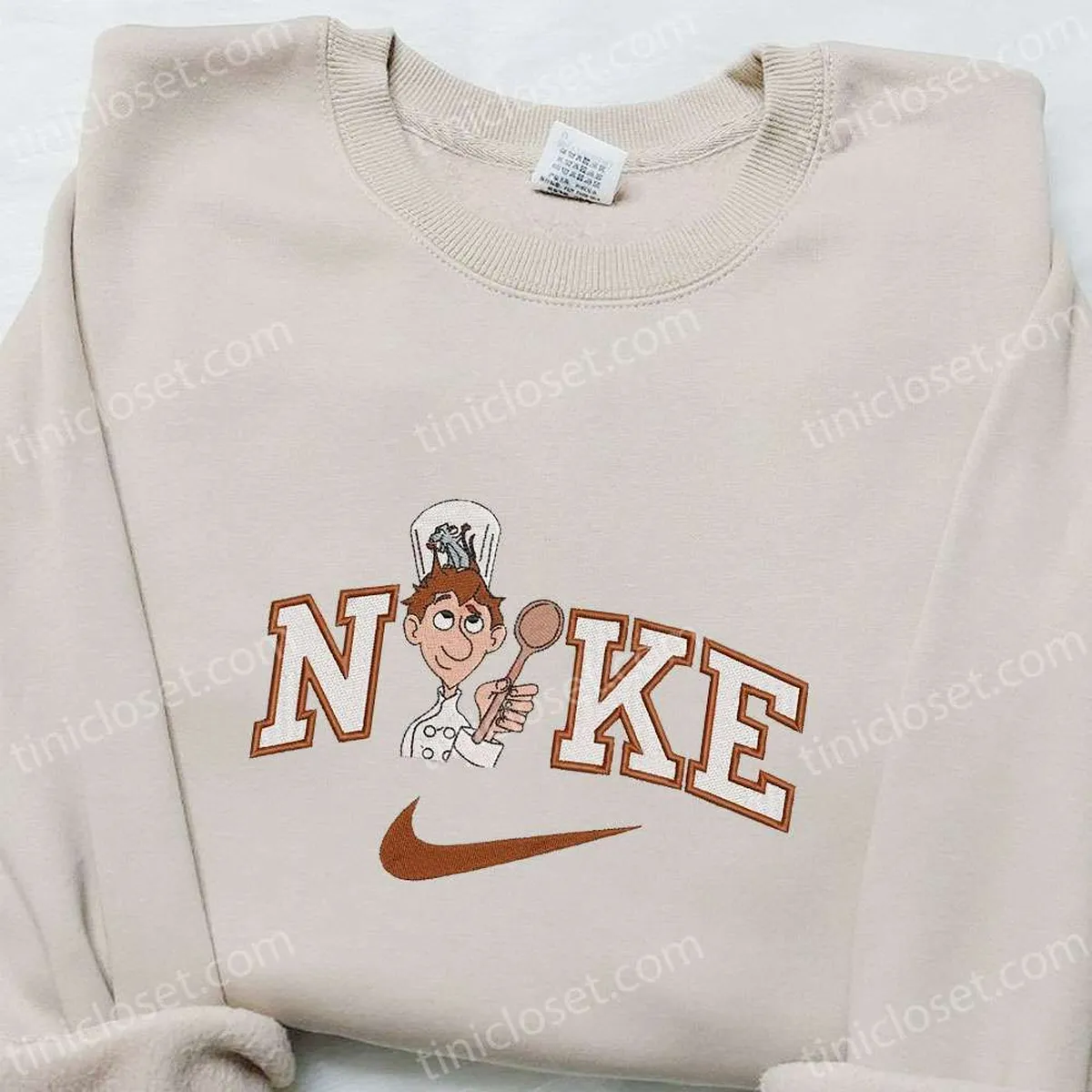 alfredo-linguini-x-nike-cartoon-embroidered-sweatshirt-disney-characters-embroidered-t-shirt-best-gift-ideas-for-family-rlgjx.webp alfredo linguini x nike cartoon embroidered sweatshirt disney characters embroidered t shirt best gift ideas for family